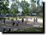 Kids playing volleyball at Salmon Fallls River Camping Resort, Lebanon, Maine